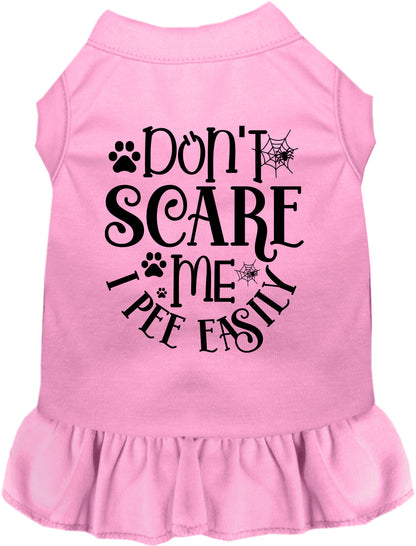 Light pink pet dress with 'Don't Scare Me I Pee Easily' text