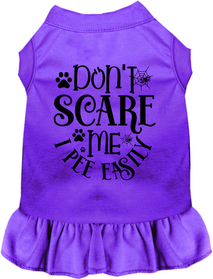 Purple pet dress with 'Don't Scare Me I Pee Easily' text