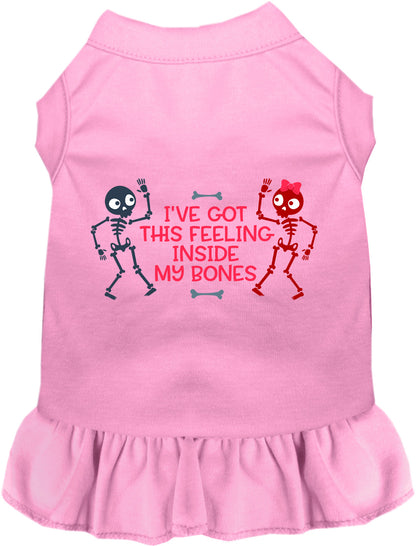 Pink pet dress with skeleton design and text