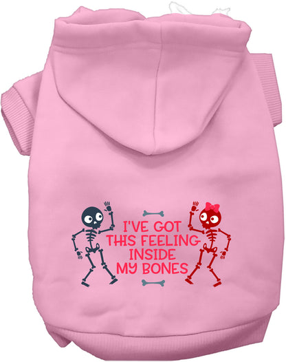 Pink Inside My Bones pet hoodie with skeleton design