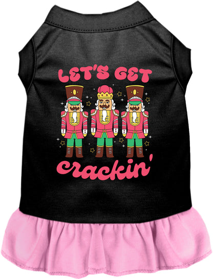 Light pink Let's Get Crackin' pet dress with nutcracker design