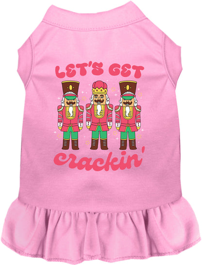 Pink Let's Get Crackin' pet dress with nutcracker design