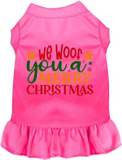 Pink pet dress with 'We Woof You a Merry Christmas' design